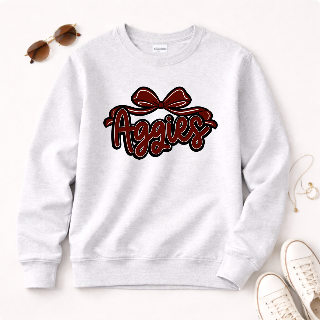 Aggies script with bow Sweatshirt | College team logo, maroon and black