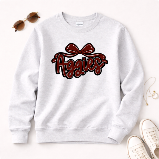 Aggies script with bow Sweatshirt | College team logo, maroon and black
