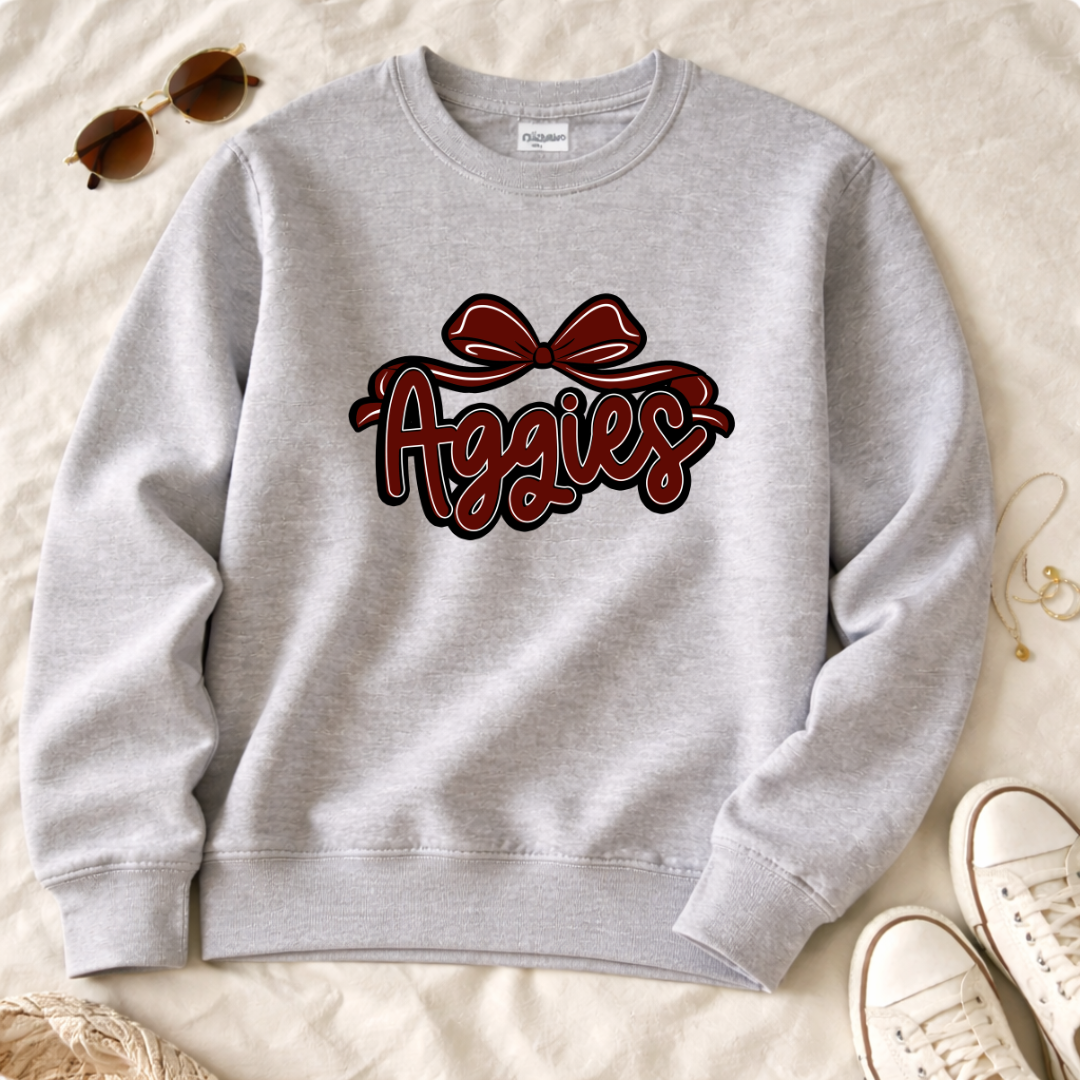 Aggies script with bow Sweatshirt | College team logo, maroon and black